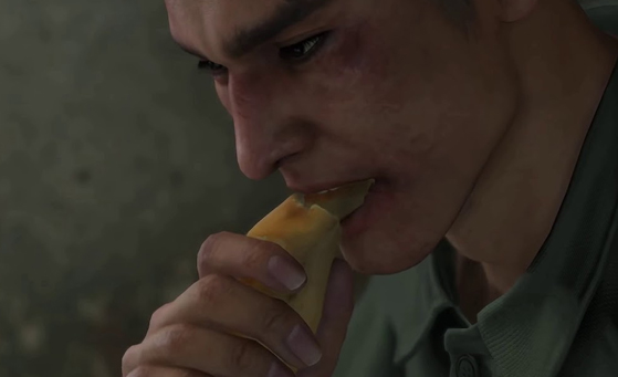 Yakuza Like a Dragon Screenshot: Ichiban eating Koppepan